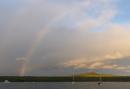 Rainbow over Rangitoto Island seen from Islington Bay